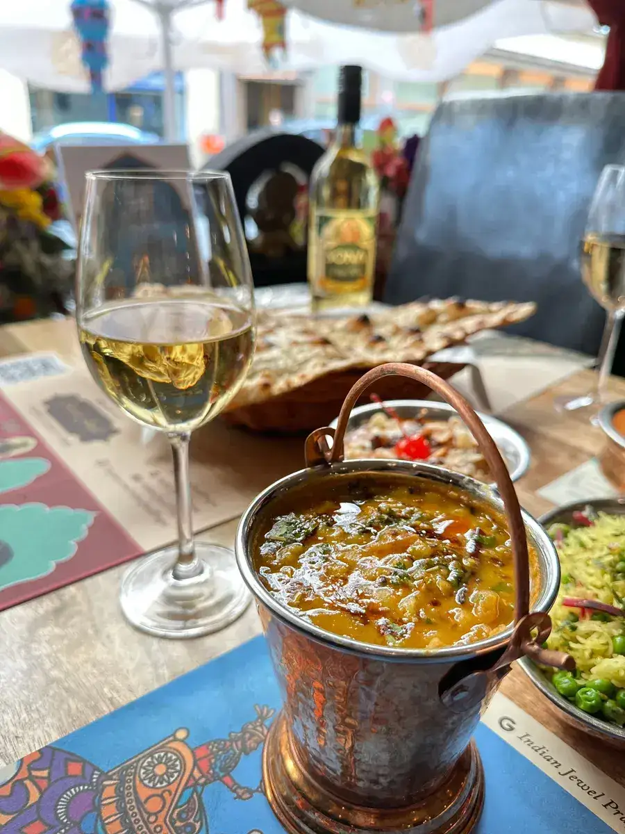 Dal in copper bucket
