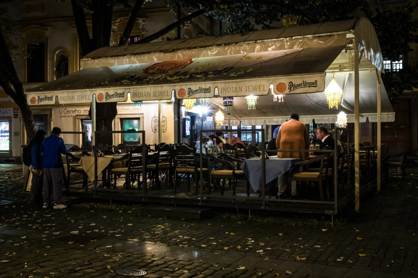 Indian Jewel's lantern-lit terrace in Prague Old Town at night